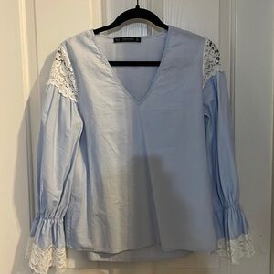 Zara size medium top on light blue